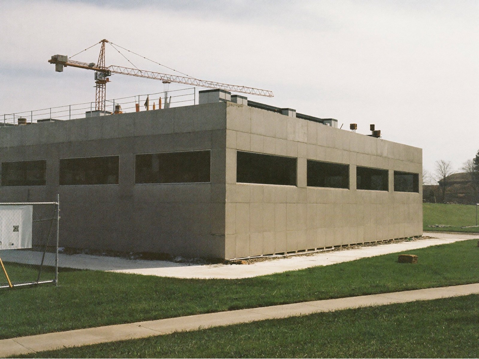 Concrete data center shell with generator yard under construction in northwest Austin