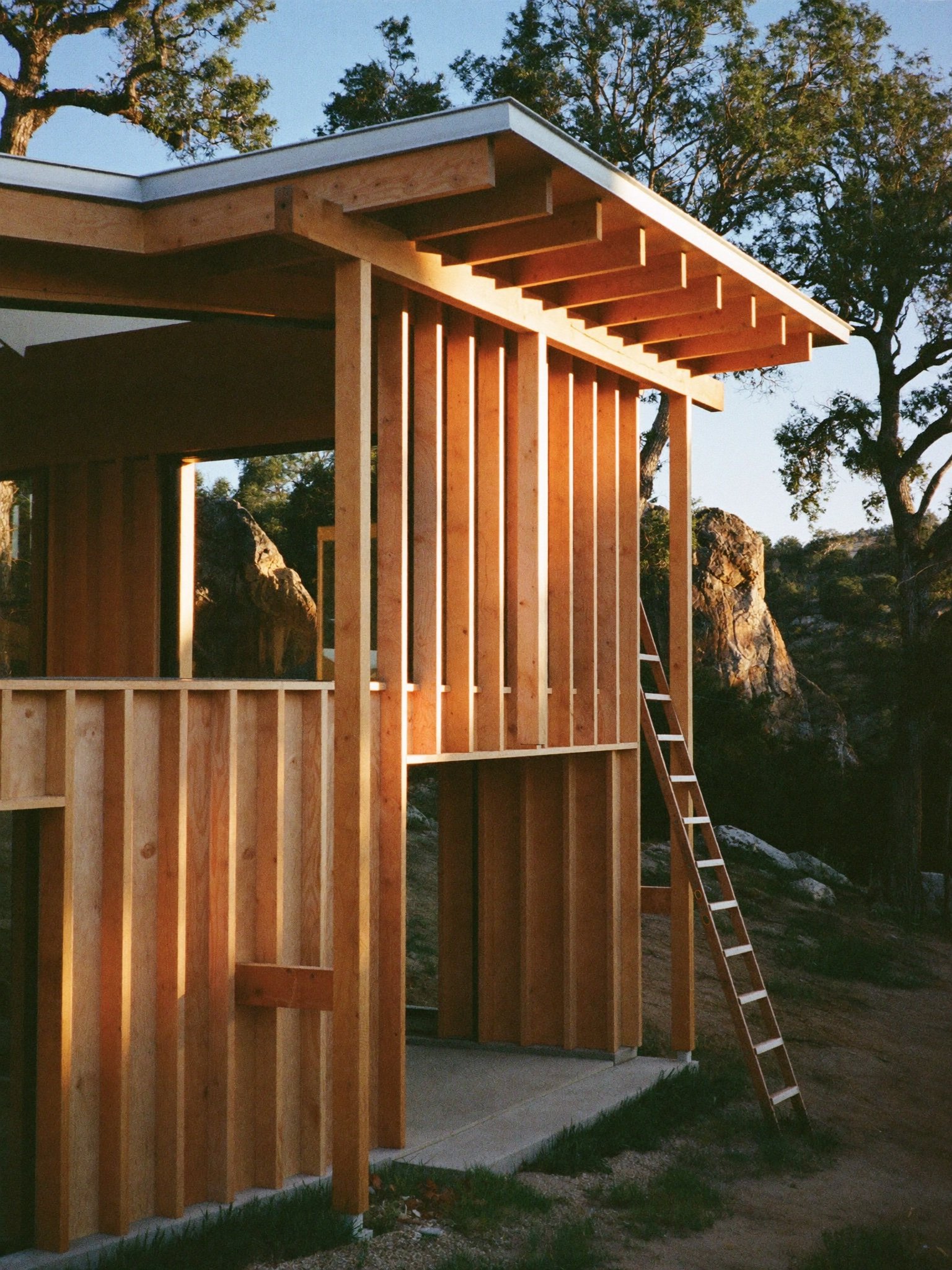 Two-story custom home under framing with Hill Country views outside Austin