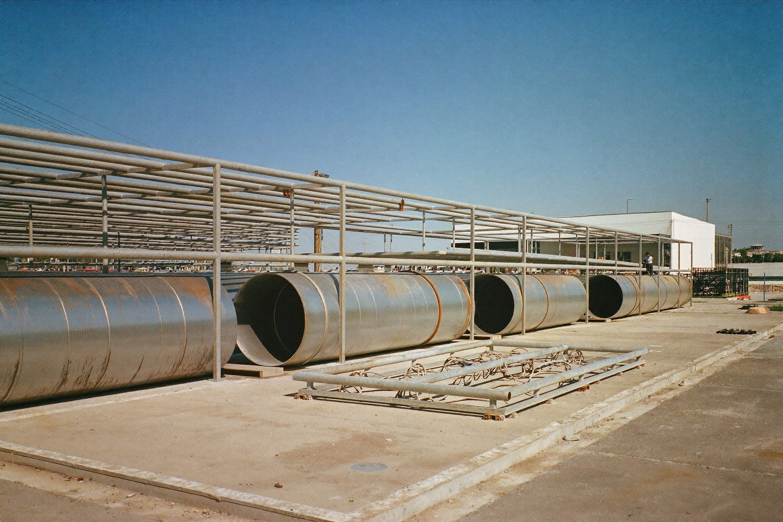 Steel pipe rack and concrete process pads at an industrial facility near Corpus Christi