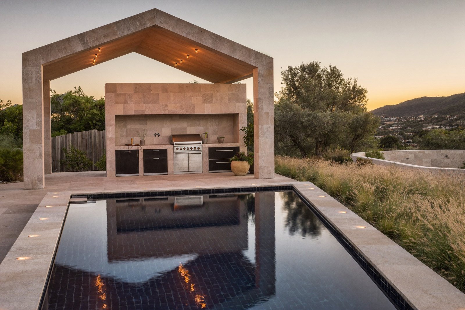 Completed pool, outdoor kitchen, and limestone pavilion at a San Antonio residence