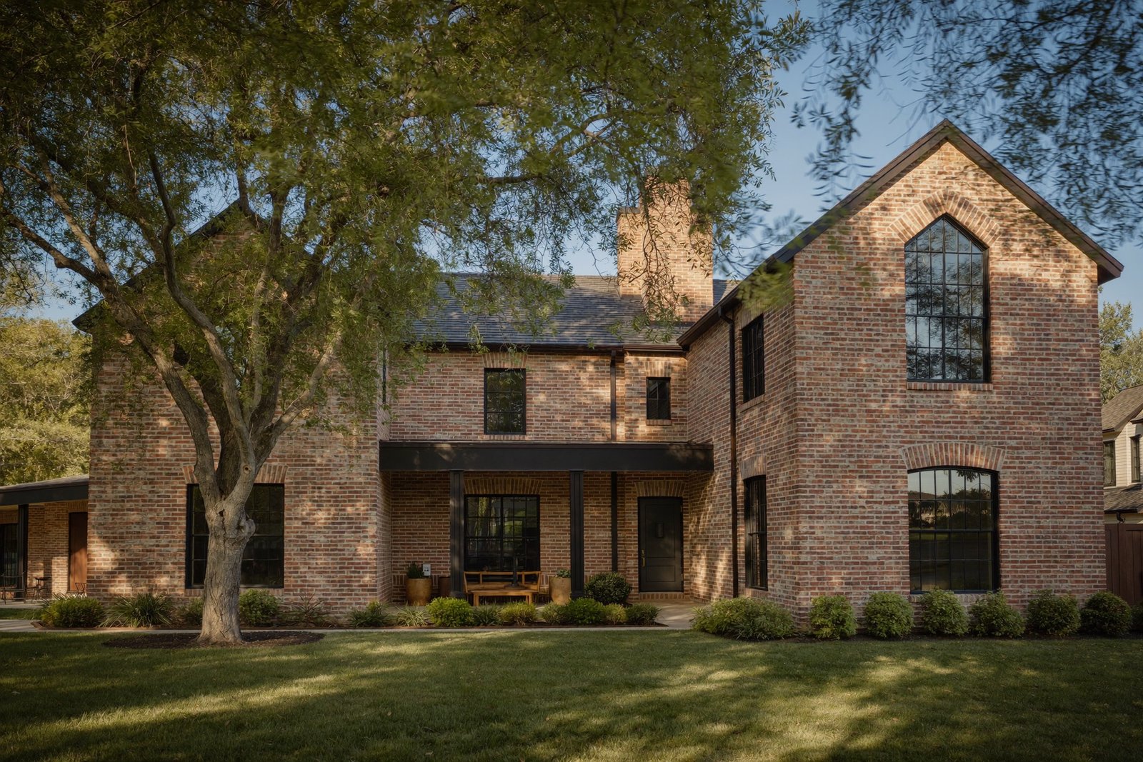 Renovated 1930s brick home with new steel windows in River Oaks, Houston